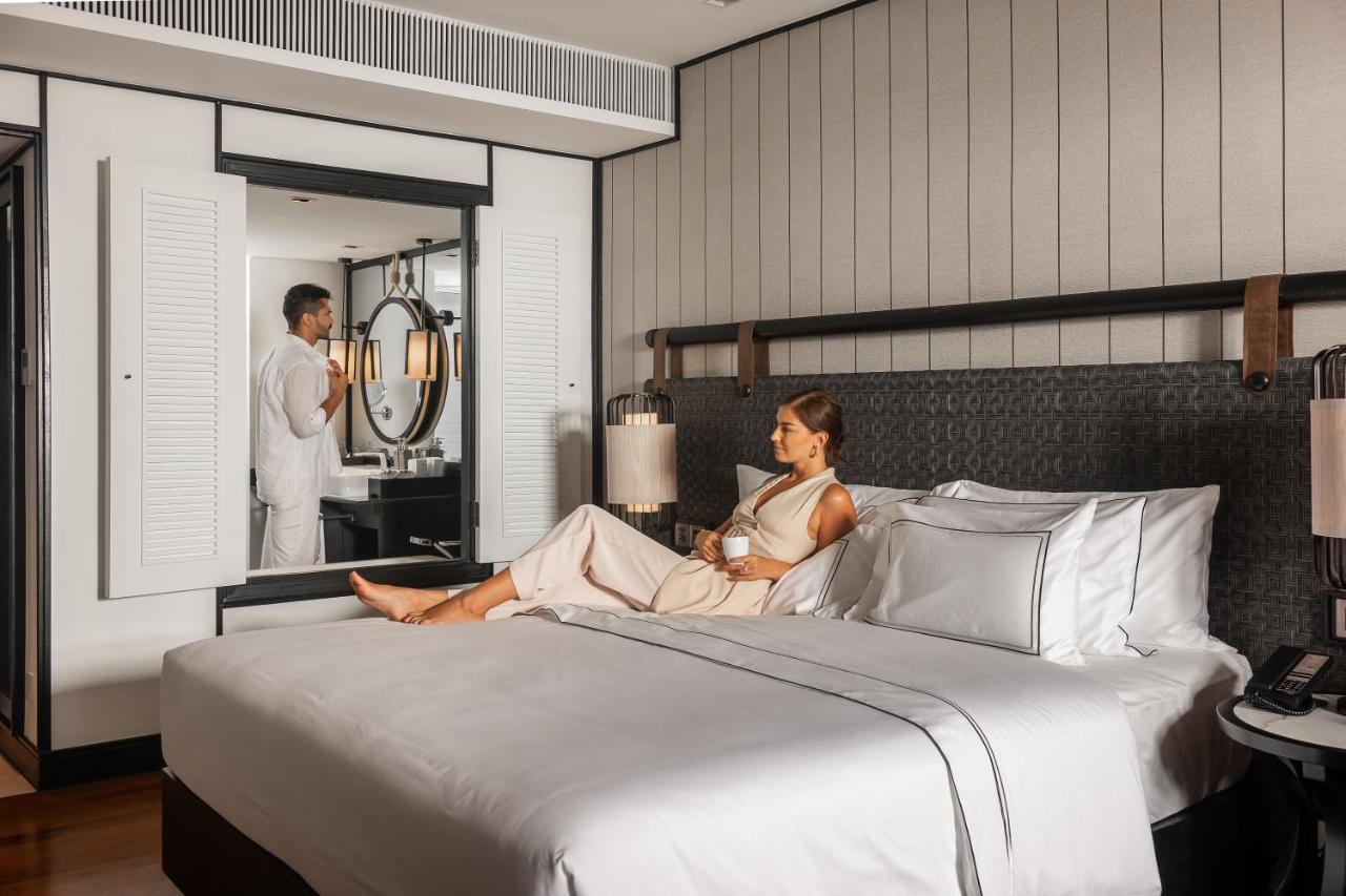 Hotel Melia Koh Samui Esterno foto A guest in a bedroom at The Standard
